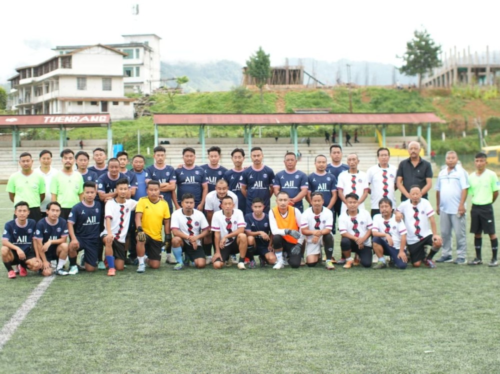 Players of CSA and SUTT before the exhibition match along with the match patron and match officials. (Morung Photo)